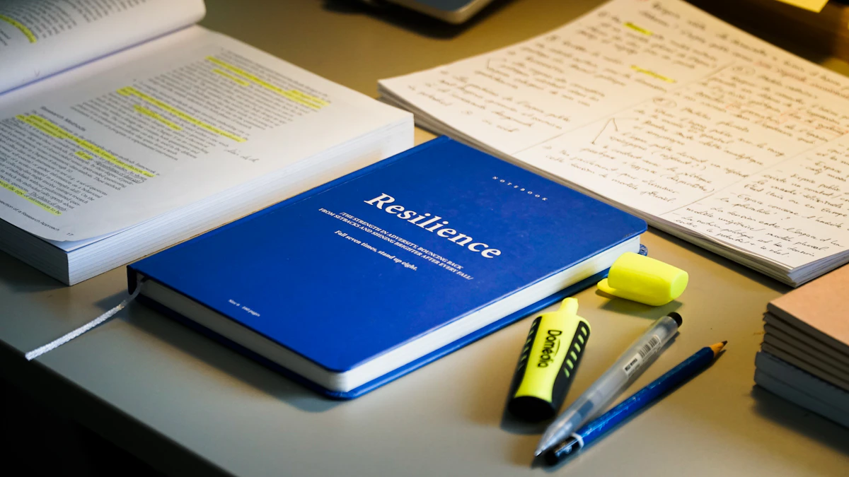 Study materials, notebook and pens laid out as a study plan for the Ontario real estate licensing course
