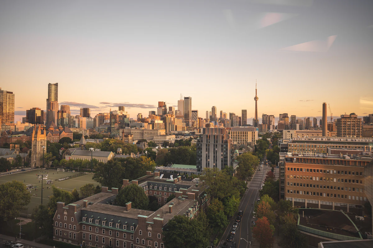 Residential condominium towers at golden hour, the property type Course 3 of the Ontario real estate program covers most